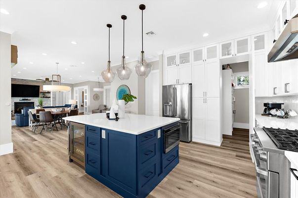 Dining room, Interior, Kitchen, Pendant Lights, Recessed Lighting, Stainless Steel Appliances, Wood Texture Flooring
