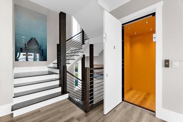 Elevator, Interior, Recessed Lighting, Wood Texture Flooring, Wooden Walls