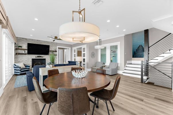 Dining room, Fireplace, Interior, Living room, Pendant Lights, Recessed Lighting, Stone Walls, Wood Texture Flooring