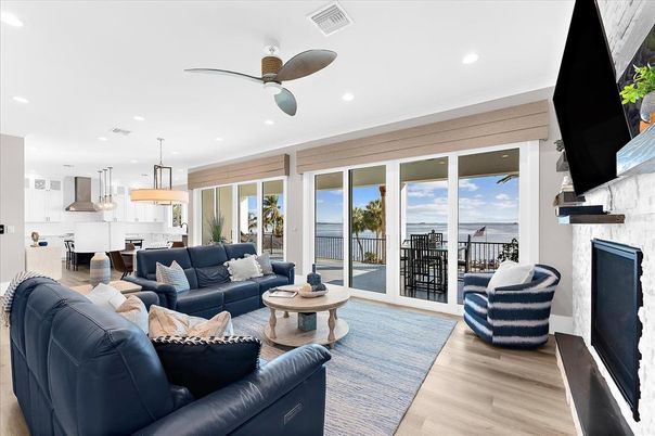 Fireplace, Interior, Kitchen, Living room, Pendant Lights, Recessed Lighting, Water, Wood Texture Flooring
