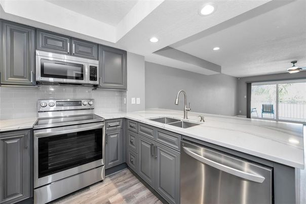 Interior, Kitchen, Recessed Lighting, Stainless Steel Appliances, Wood Texture Flooring