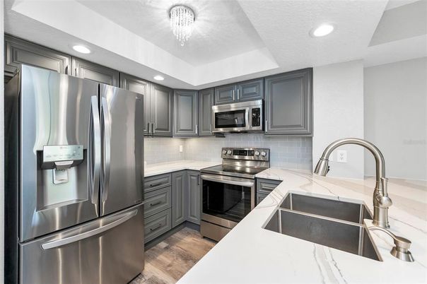 Interior, Kitchen, Recessed Lighting, Stainless Steel Appliances, Wood Texture Flooring