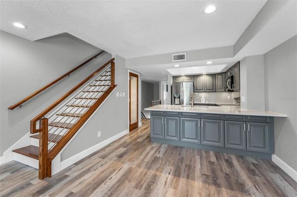 Interior, Kitchen, Recessed Lighting, Stainless Steel Appliances, Wood Texture Flooring