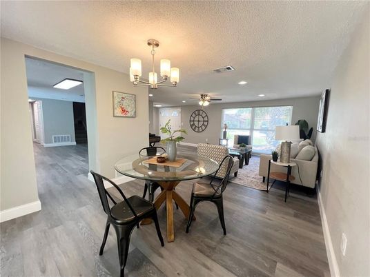 Chandelier, Dining room, Interior, Living room, Recessed Lighting, Wood Texture Flooring