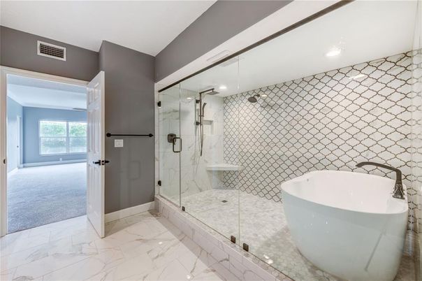 Bathroom, Free Standing Baths, Glass Shower, Interior, Marble, Marble Walls, Recessed Lighting
