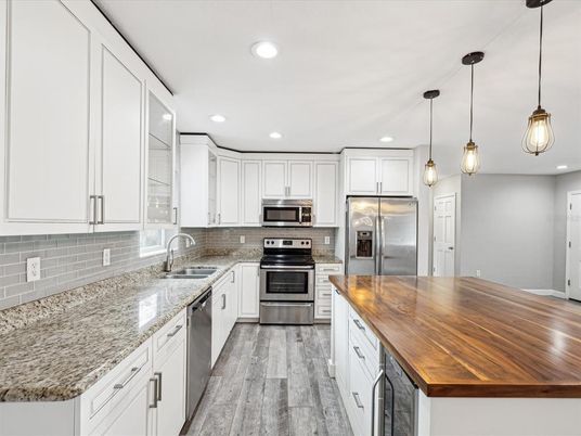 Interior, Kitchen, Pendant Lights, Recessed Lighting, Stainless Steel Appliances, Wood Texture Flooring