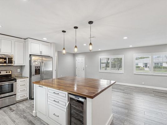 Interior, Kitchen, Pendant Lights, Recessed Lighting, Stainless Steel Appliances, Wood Texture Flooring