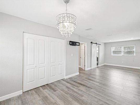 Chandelier, Empty room, Interior, Recessed Lighting, Wood Texture Flooring