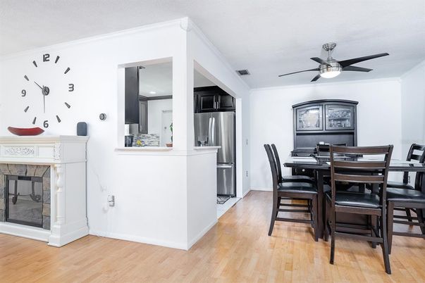Dining room, Fireplace, Interior, Kitchen, Recessed Lighting, Wood Texture Flooring