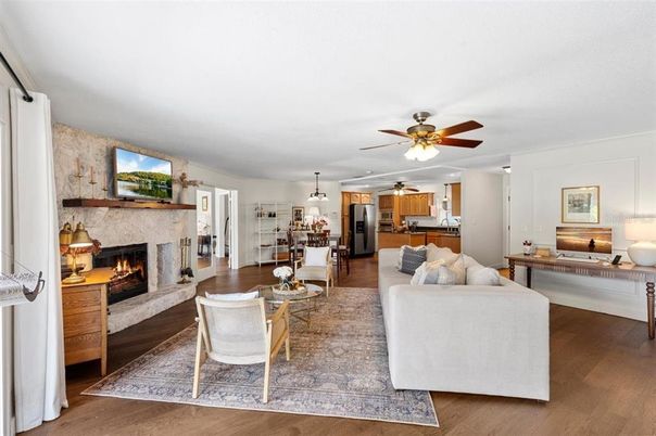 Fireplace, Interior, Kitchen, Living room, Pendant Lights, Stainless Steel Appliances, Wood Texture Flooring