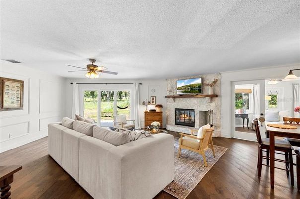 Dining room, Fireplace, Interior, Living room, Pendant Lights, Wood Texture Flooring