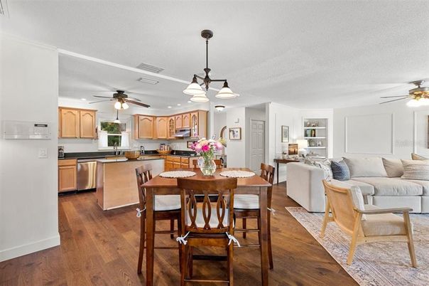 Dining room, Interior, Kitchen, Living room, Pendant Lights, Stainless Steel Appliances, Wood Texture Flooring