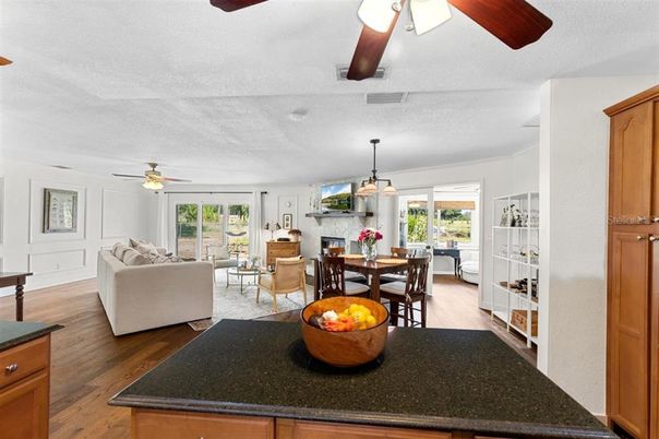 Dining room, Fireplace, Interior, Living room, Pendant Lights, Wood Texture Flooring