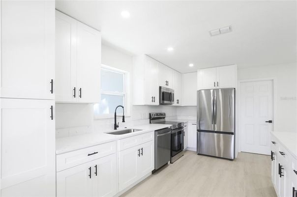 Interior, Kitchen, Recessed Lighting, Stainless Steel Appliances, Wood Texture Flooring