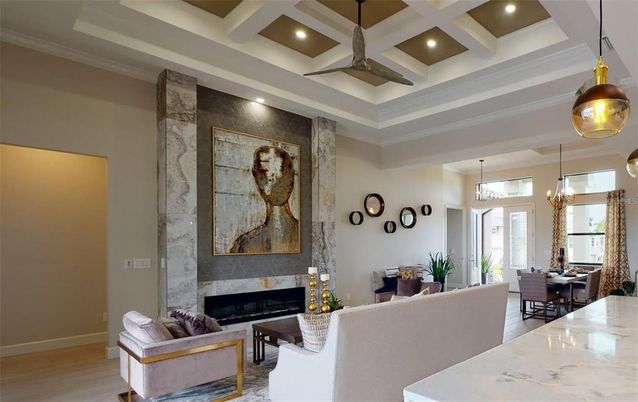 Dining room, Fireplace, Interior, Living room, Pendant Lights, Recessed Lighting, Wood Texture Flooring