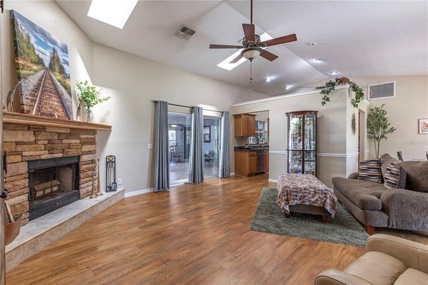 Fireplace, Interior, Kitchen, Living room, Recessed Lighting, Wood Texture Flooring