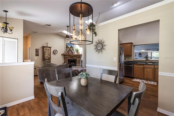 Dining room, Fireplace, Interior, Kitchen, Living room, Pendant Lights, Wood Texture Flooring