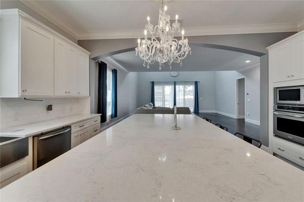 Chandelier, Interior, Kitchen, Recessed Lighting, Stainless Steel Appliances, Wood Texture Flooring