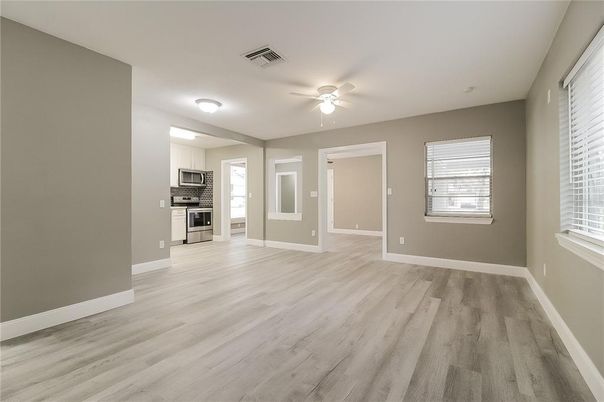 Empty room, Interior, Kitchen, Stainless Steel Appliances, Wood Texture Flooring