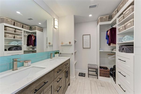 Bathroom, Dual Sink Vanities, Interior, Recessed Lighting, Walk-in Closets