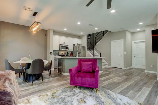 Dining room, Interior, Kitchen, Pendant Lights, Recessed Lighting, Stainless Steel Appliances, Wood Texture Flooring