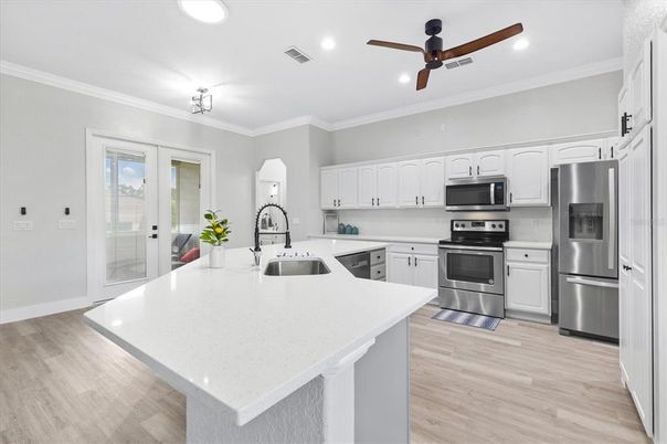 Interior, Kitchen, Recessed Lighting, Stainless Steel Appliances, Wood Texture Flooring
