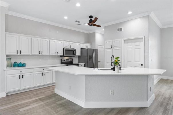 Interior, Kitchen, Recessed Lighting, Stainless Steel Appliances, Wood Texture Flooring