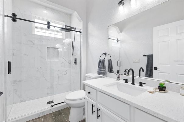 Bathroom, Glass Shower, Interior, Marble Walls, Wood Texture Flooring