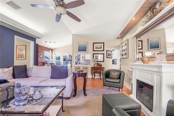 Dining room, Fireplace, Interior, Living room, Recessed Lighting, Wood Texture Flooring