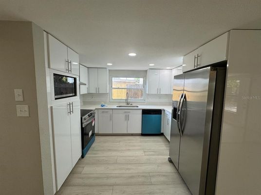 Interior, Kitchen, Recessed Lighting, Stainless Steel Appliances, Wood Texture Flooring