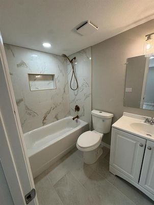 Bathroom, Dual Sink Vanities, Interior, Marble Walls, Recessed Lighting