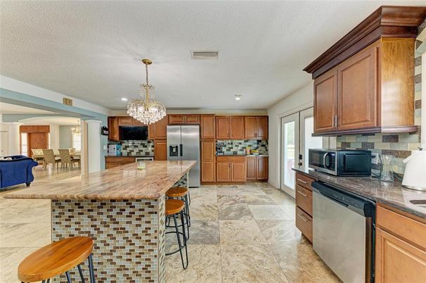 Chandelier, Dining room, Interior, Kitchen, Recessed Lighting, Stainless Steel Appliances