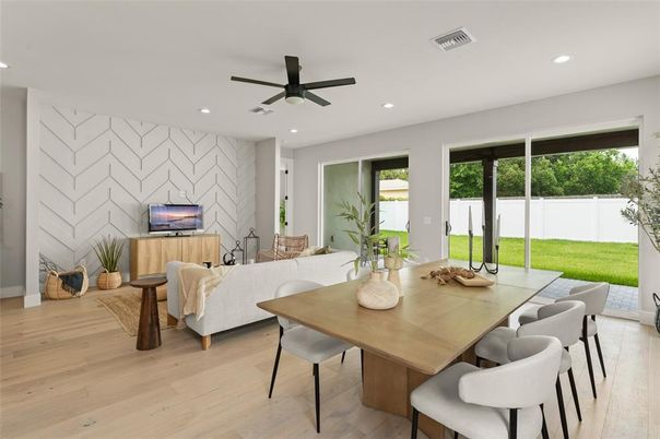 Dining room, Interior, Living room, Recessed Lighting, Stone Walls, Wood Texture Flooring