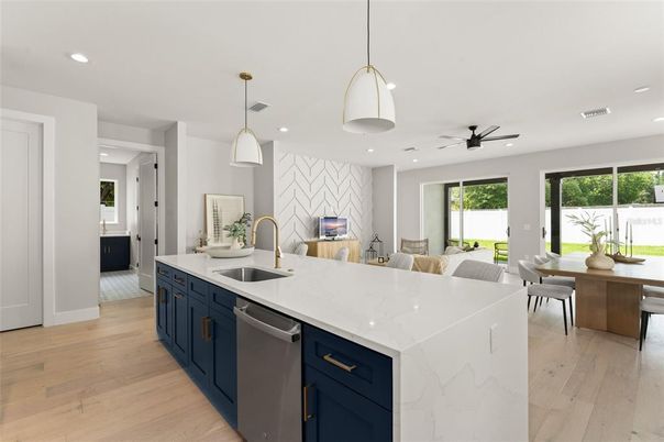 Dining room, Interior, Kitchen, Pendant Lights, Recessed Lighting, Stainless Steel Appliances, Wood Texture Flooring