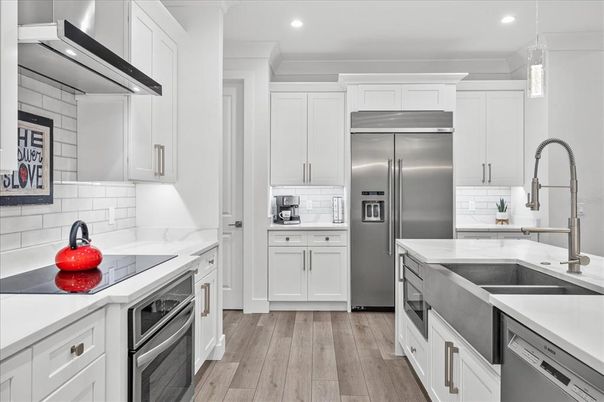 Interior, Kitchen, Recessed Lighting, Stainless Steel Appliances, Wood Texture Flooring