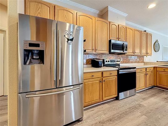 Interior, Kitchen, Recessed Lighting, Stainless Steel Appliances, Wood Texture Flooring