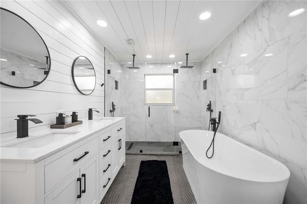 Bathroom, Dual Sink Vanities, Free Standing Baths, Interior, Marble Walls, Recessed Lighting
