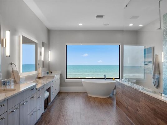 Bathroom, Dual Sink Vanities, Free Standing Baths, Interior, Recessed Lighting, Water, Wood Texture Flooring