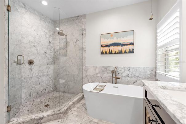 Bathroom, Free Standing Baths, Glass Shower, Interior, Marble, Marble Walls, Recessed Lighting