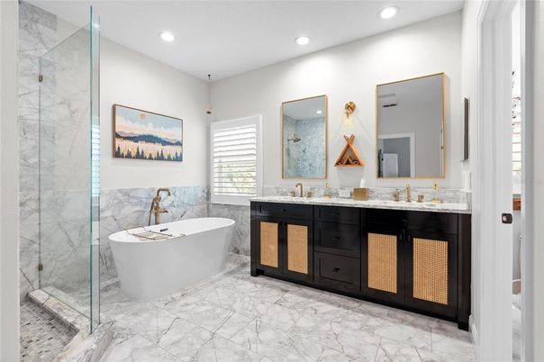 Bathroom, Dual Sink Vanities, Free Standing Baths, Glass Shower, Interior, Marble, Marble Walls, Recessed Lighting