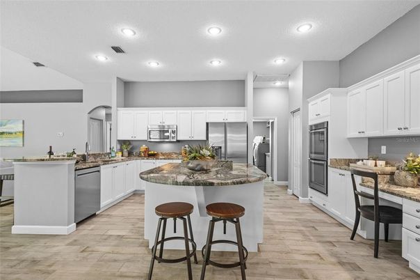Interior, Kitchen, Recessed Lighting, Stainless Steel Appliances, Wood Texture Flooring