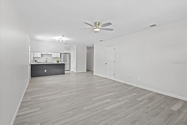 Empty room, Interior, Kitchen, Stainless Steel Appliances, Wood Texture Flooring