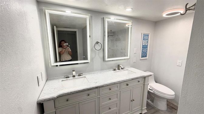 Bathroom, Dual Sink Vanities, Interior, Recessed Lighting, Wood Texture Flooring