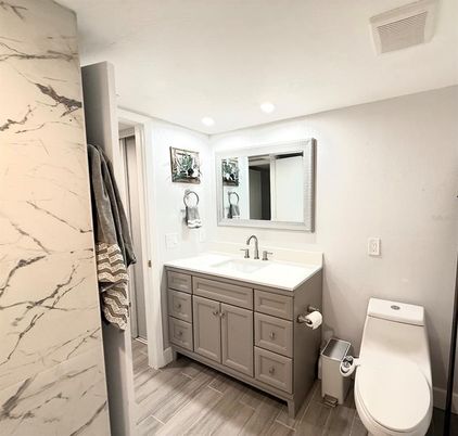 Bathroom, Interior, Marble Walls, Recessed Lighting, Wood Texture Flooring