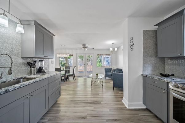 Chandelier, Dining room, Interior, Kitchen, Living room, Pendant Lights, Wood Texture Flooring