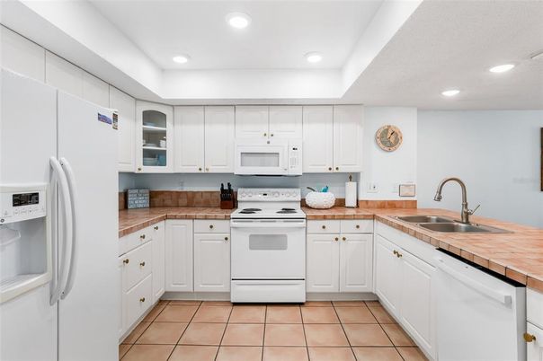 Interior, Kitchen, Recessed Lighting, Tile Countertops