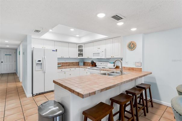 Interior, Kitchen, Recessed Lighting, Tile Countertops
