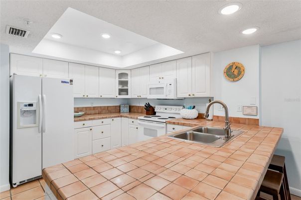 Interior, Kitchen, Recessed Lighting, Tile Countertops