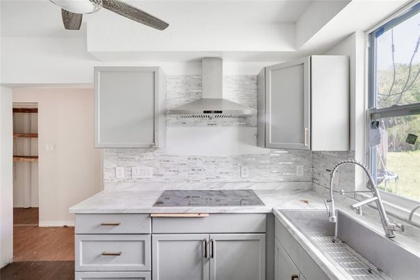 Interior, Kitchen, Marble Walls, Stainless Steel Appliances, Wood Texture Flooring