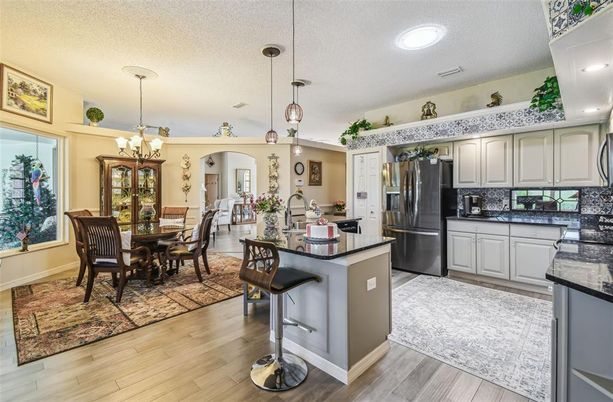 Chandelier, Dining room, Interior, Kitchen, Pendant Lights, Recessed Lighting, Wood Texture Flooring